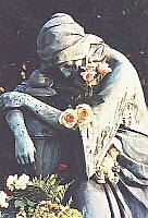 
       mourning woman   
               at the   
   anonymous urn ground   

